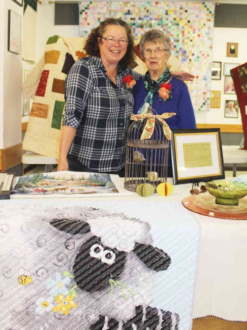 Current president Carly Rainville and founder Lois Weber of the Plevna Craft Ladies Group welcomed the public to the club’s 25th anniversary last week in Plevna